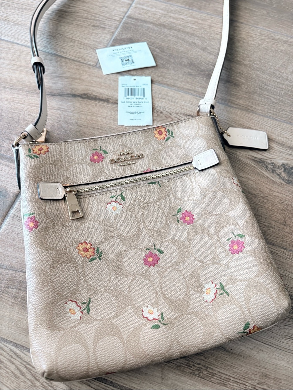 Almost New COACH Mini Rowen File Bag - Flower Coach purse